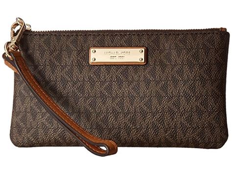 brown michael kors wristlet|michael kors black wallet women's.